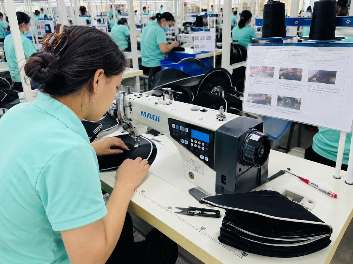 Employees working in a clean production environment